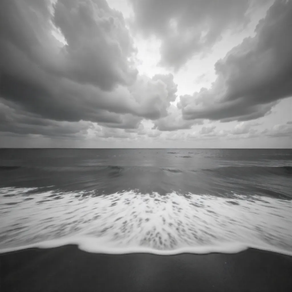 Monochrome Serenity: Expansive Sky Over Quiet Sea