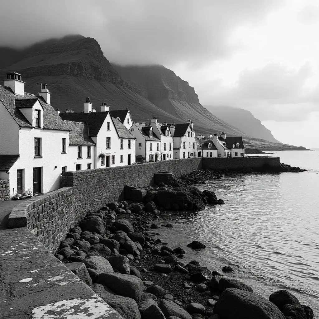 Monochrome Coastal Village with Mountain Backdrop