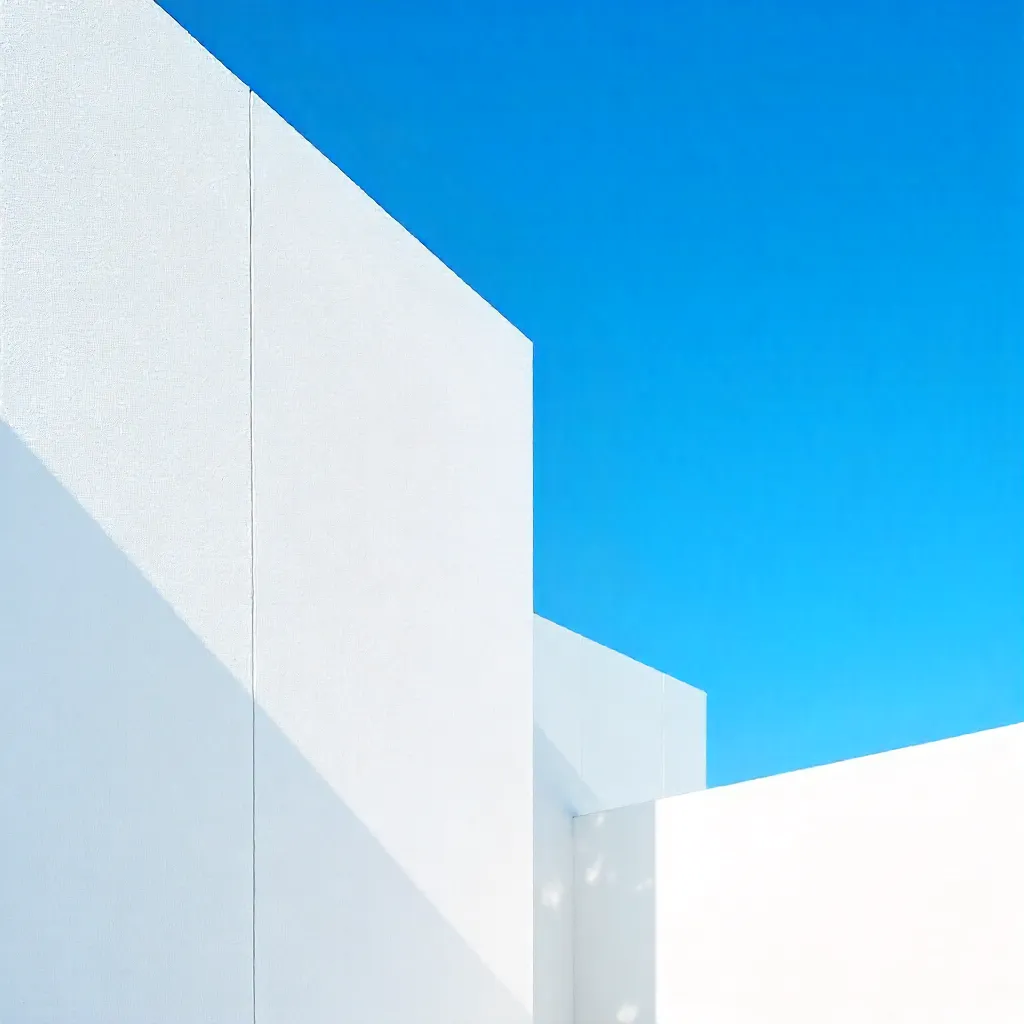 White Geometric Wall Meets Vivid Blue Sky