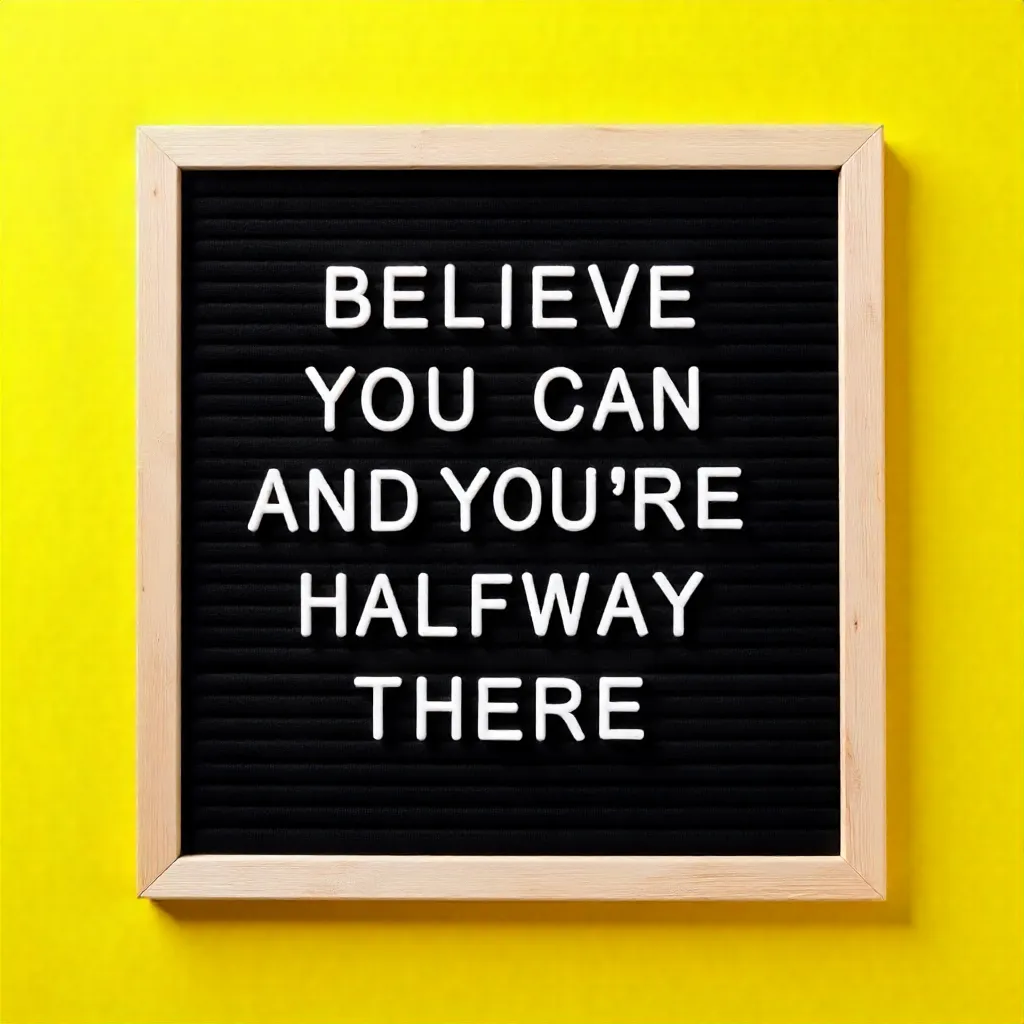 Motivational Quote on Black Letter Board on Yellow